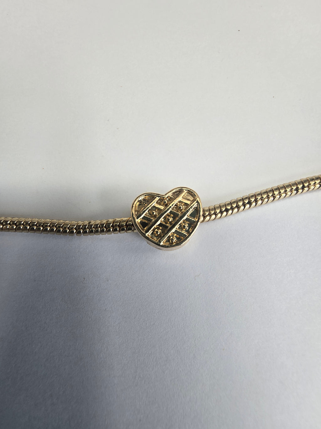 Gold charm fits all charm bracelets