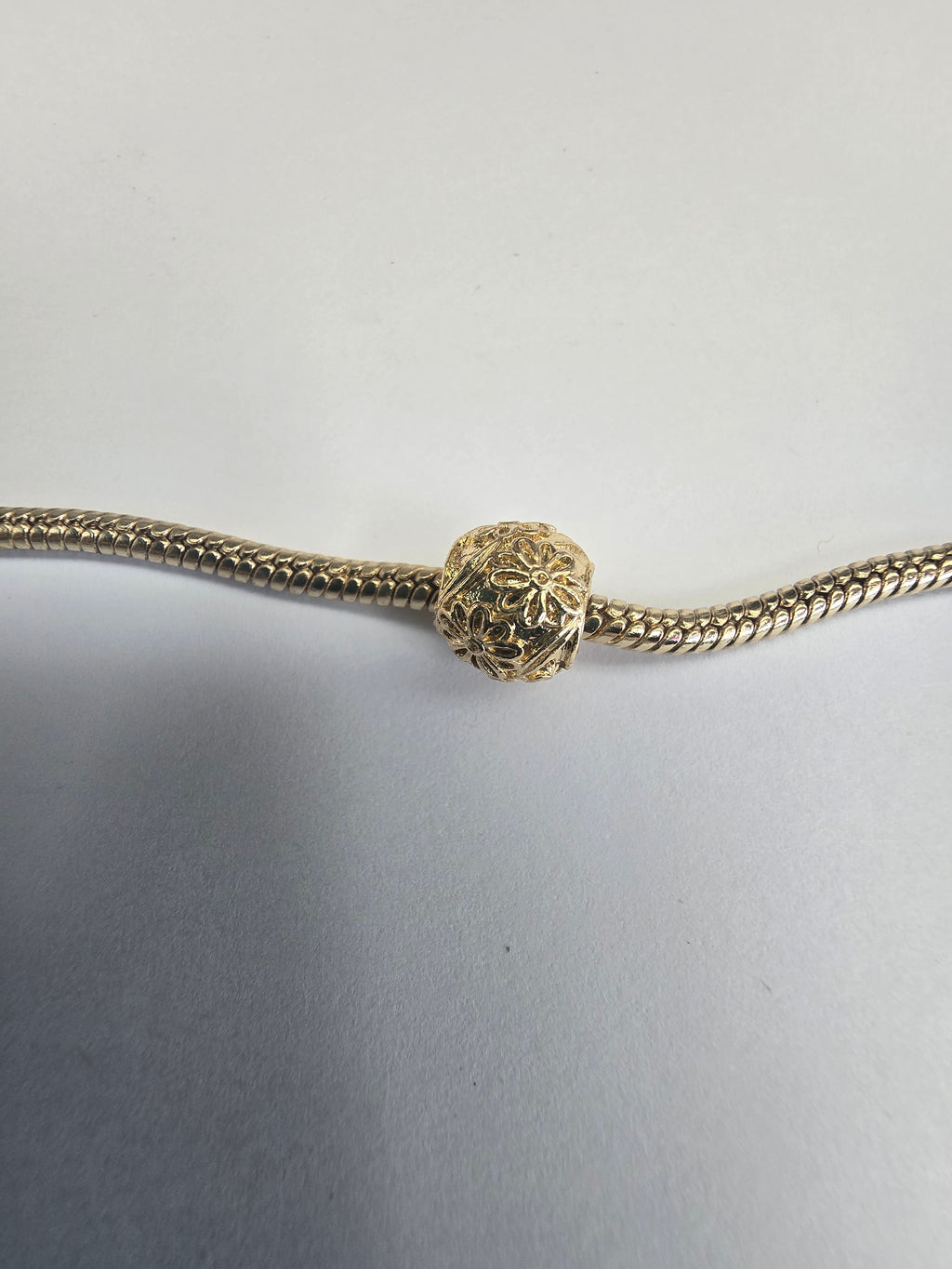 Gold charm fits all charm bracelets