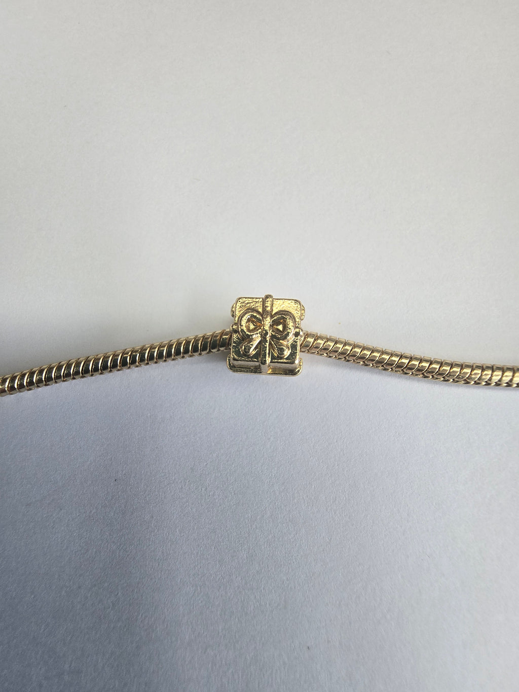 Gold charm fits all charm bracelets