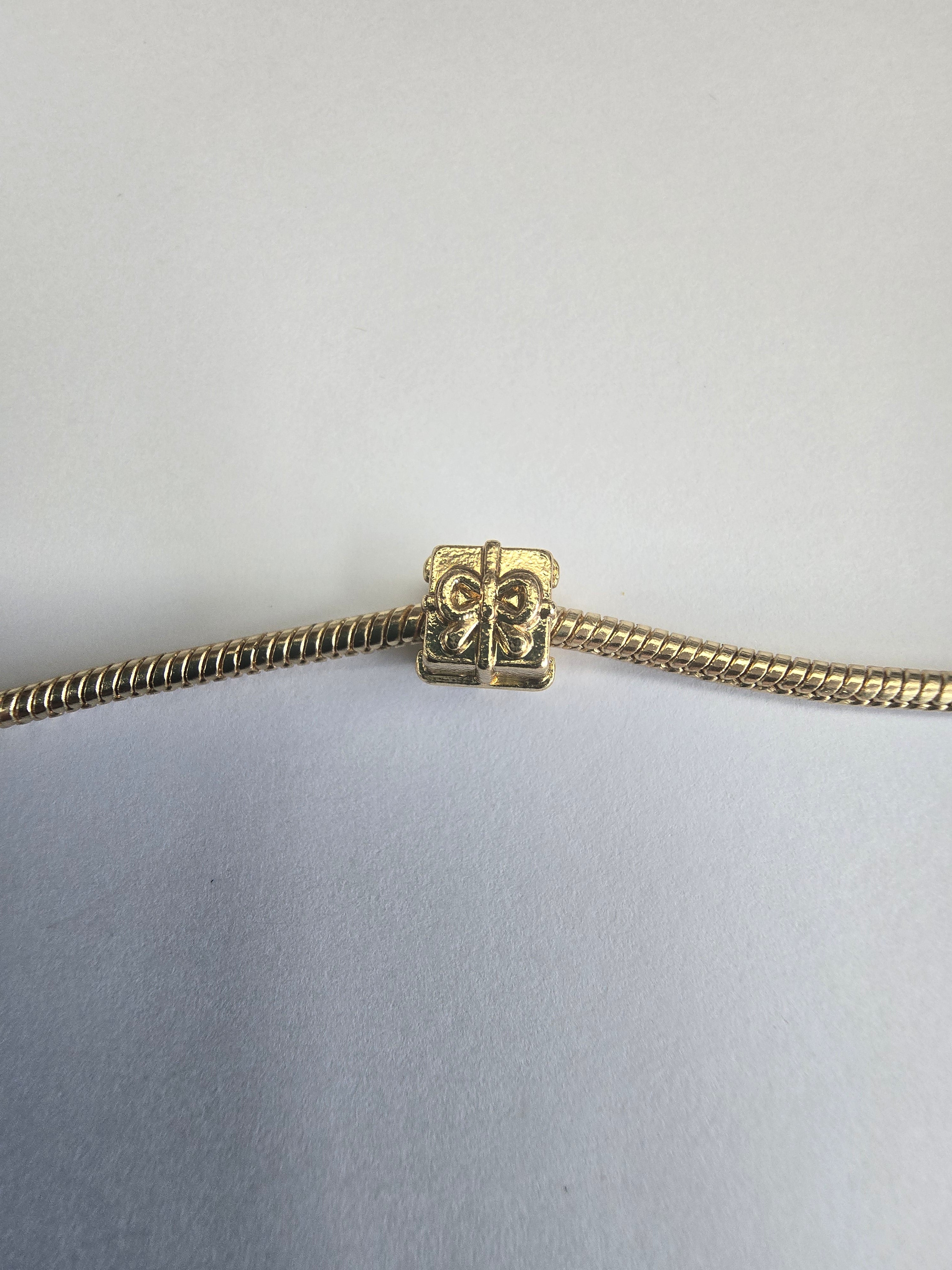 Gold charm fits all charm bracelets