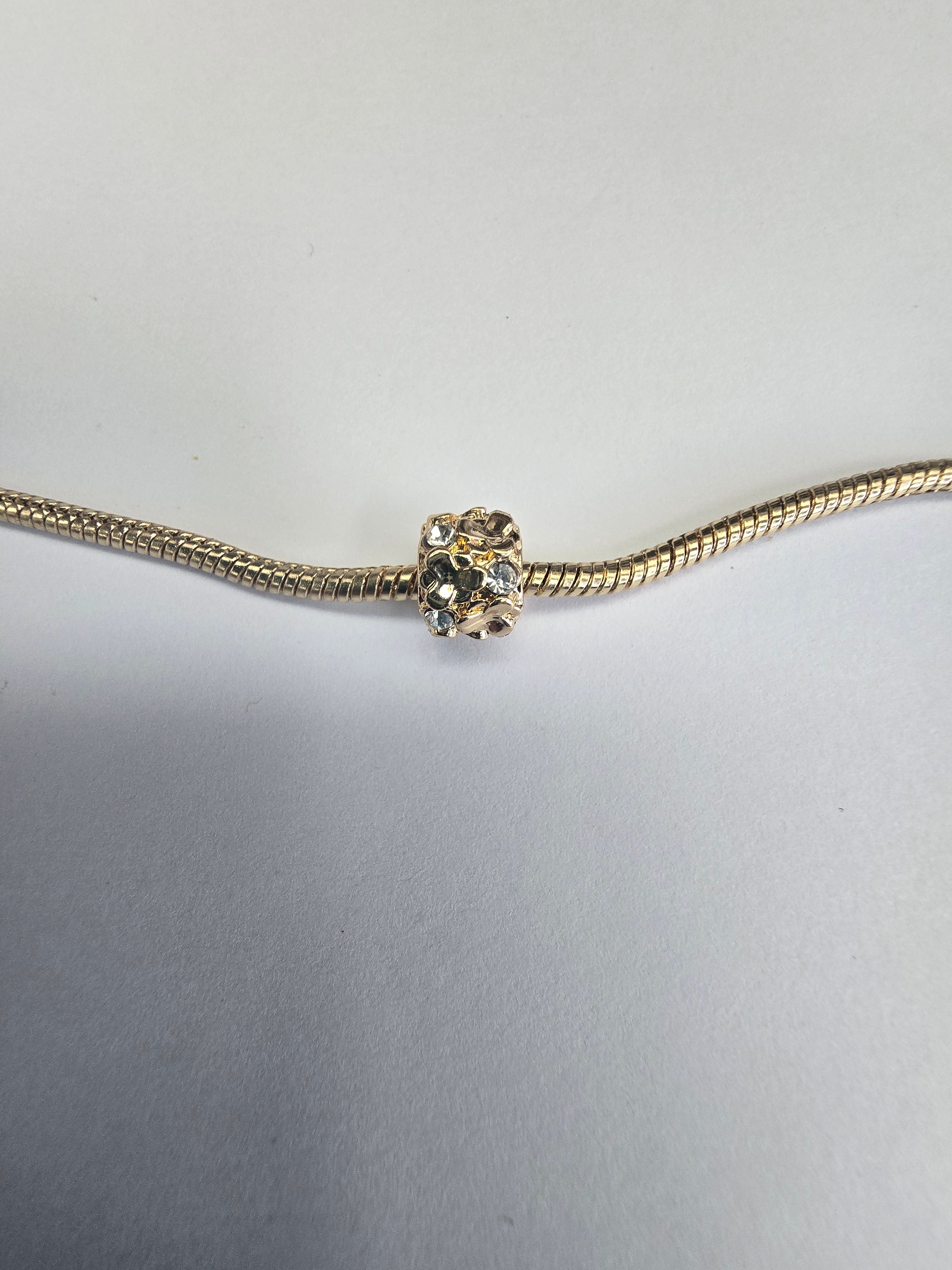 Gold charm fits all charm bracelets