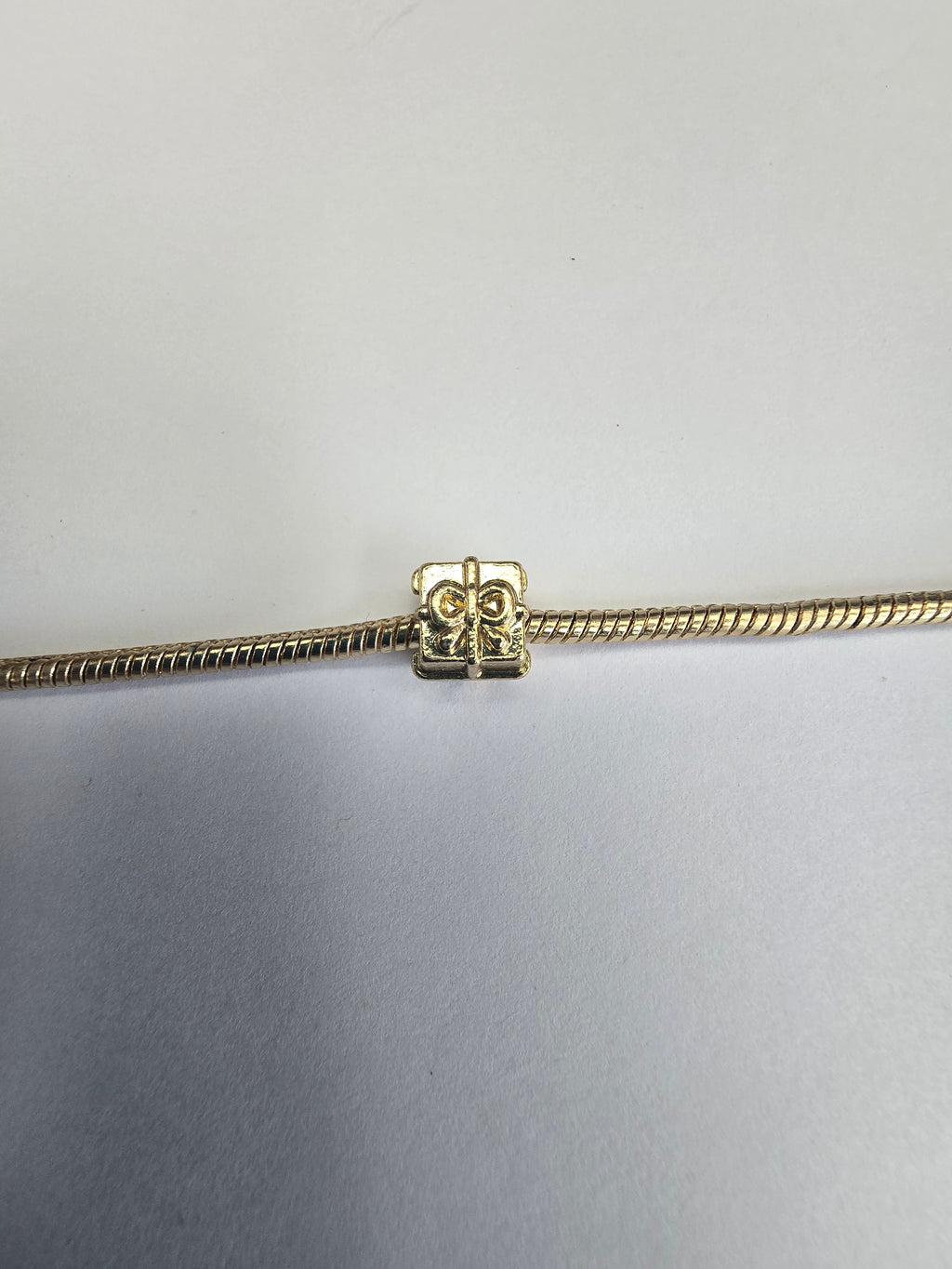 Gold charm fits all charm bracelets