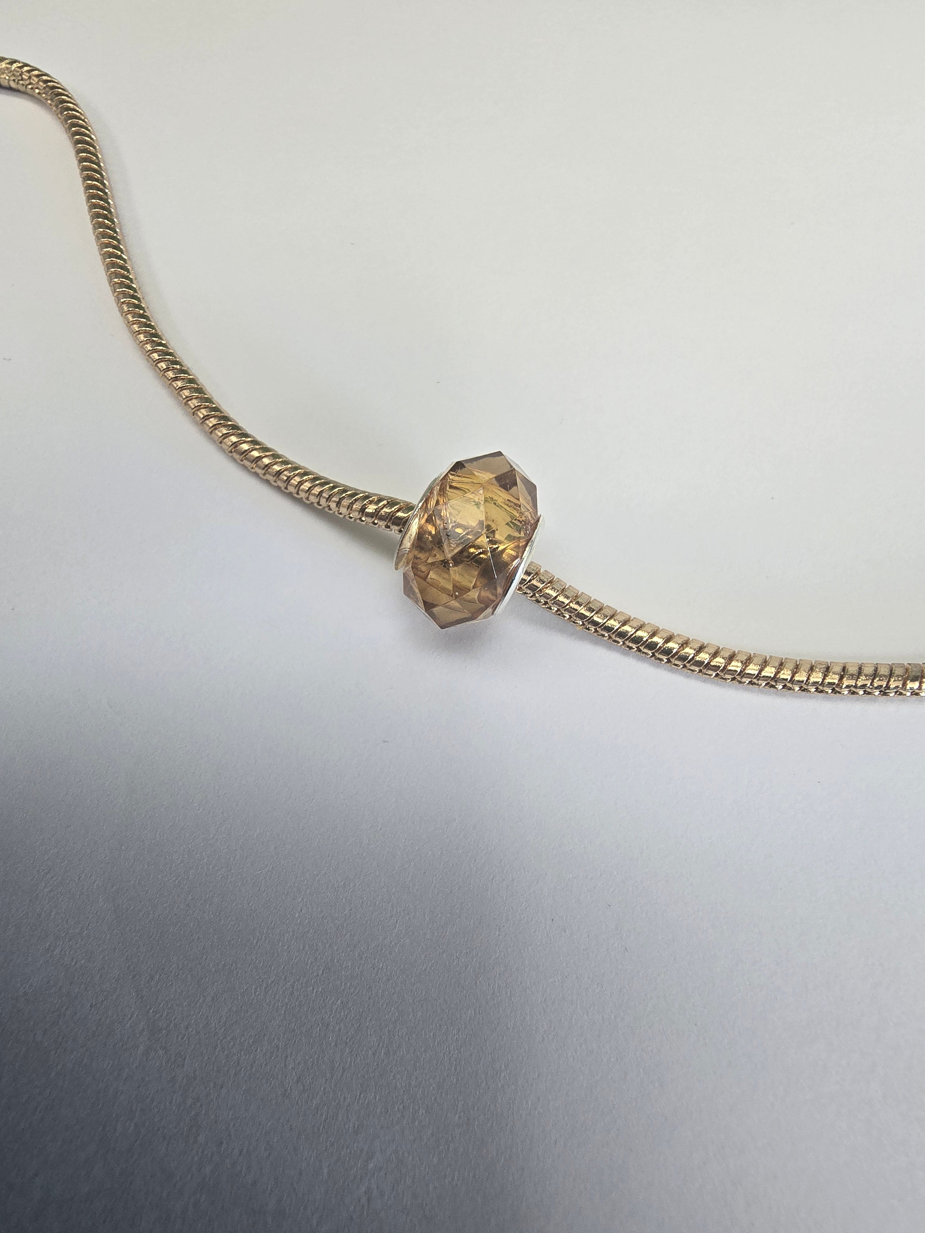 Gold charm fits all charm bracelets