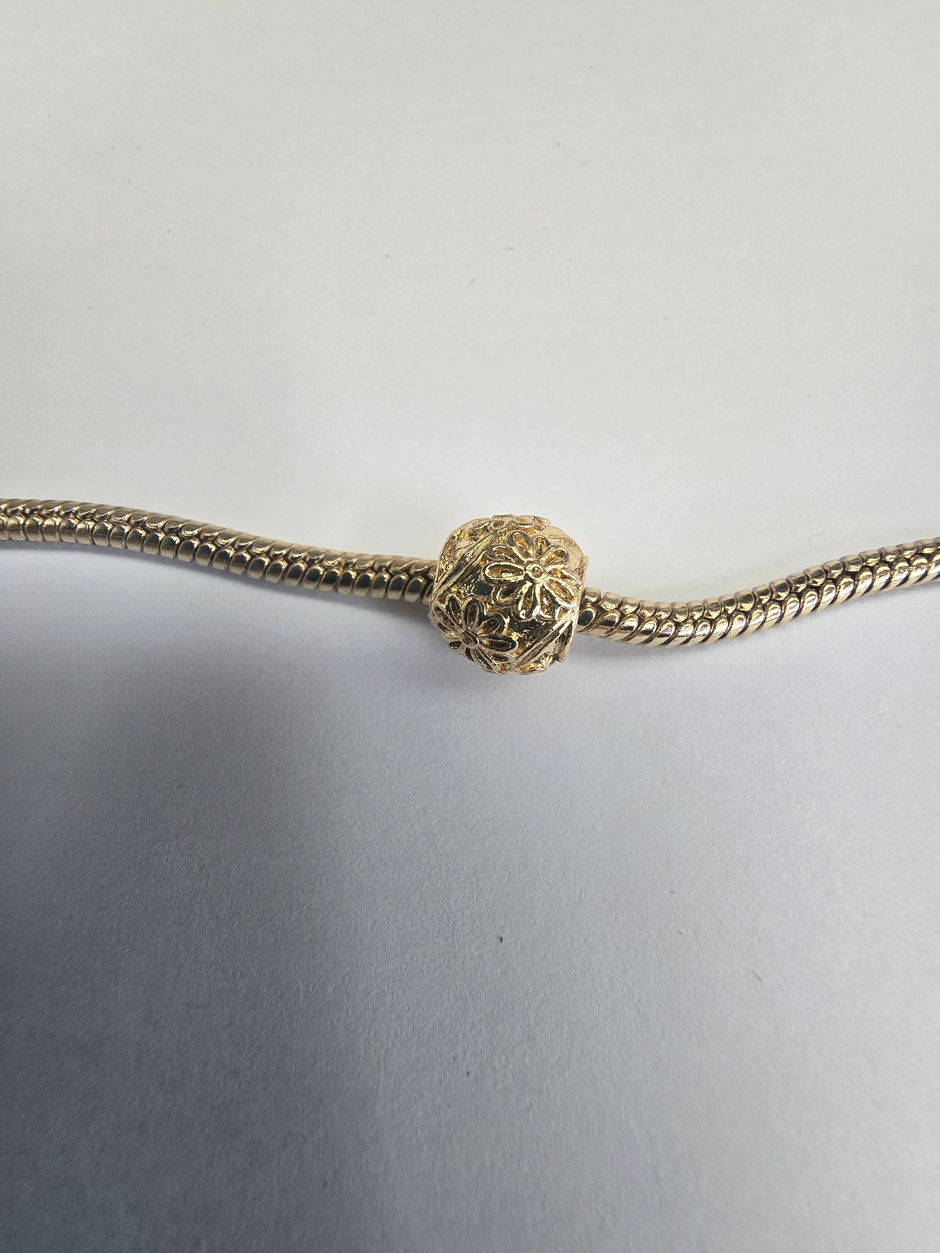 Gold charm fits all charm bracelets