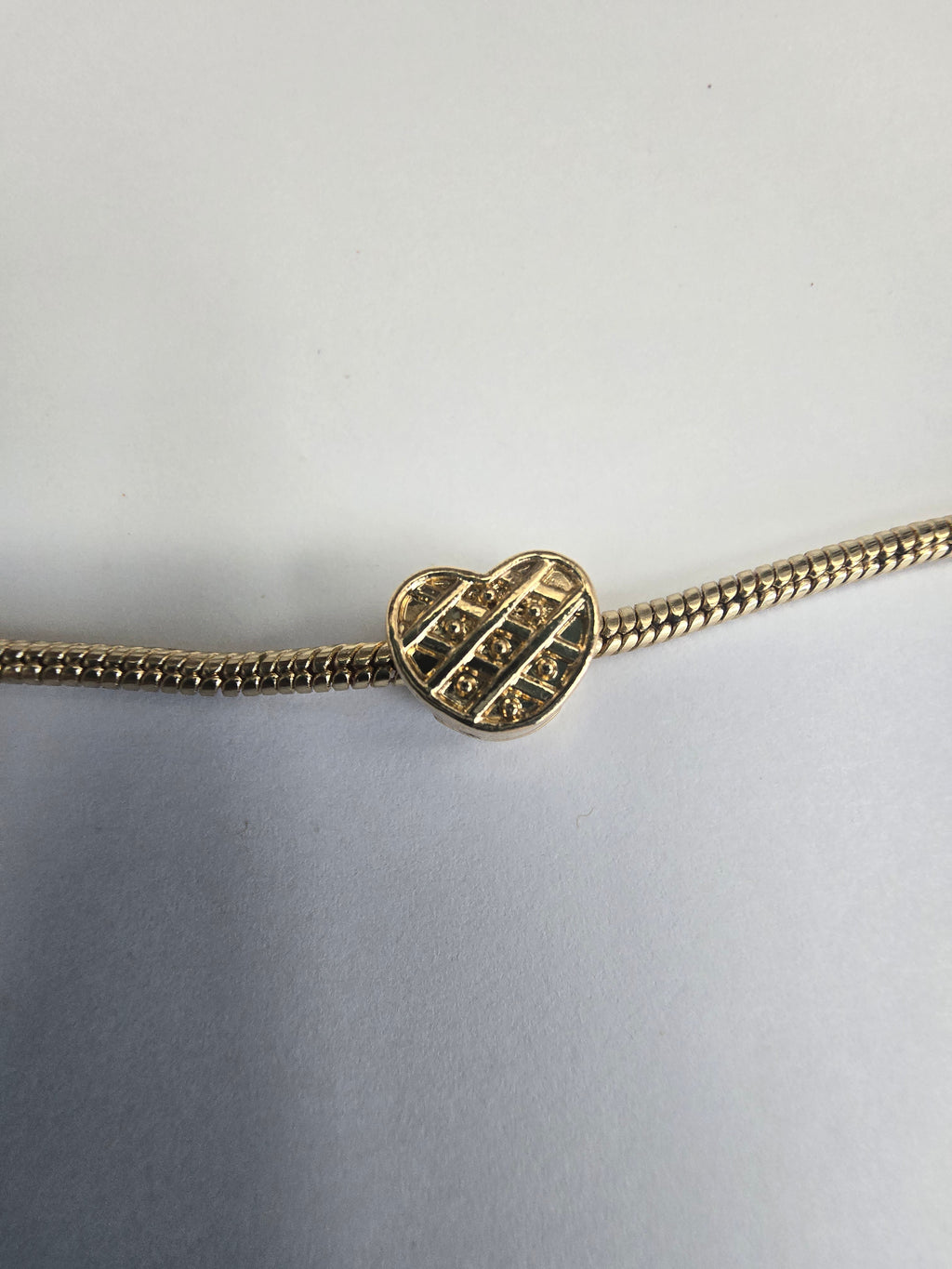 Gold charm fits all charm bracelets