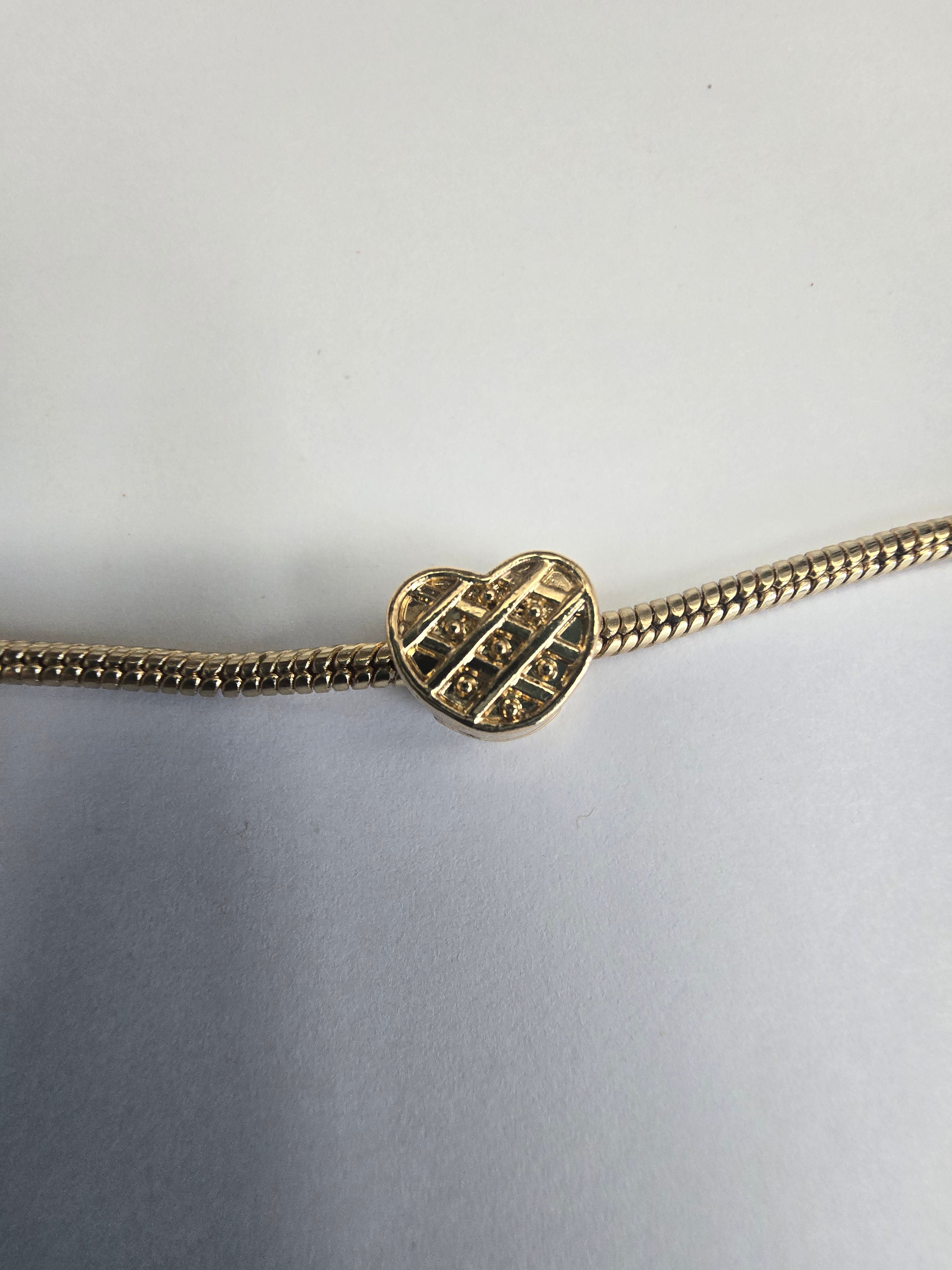 Gold charm fits all charm bracelets