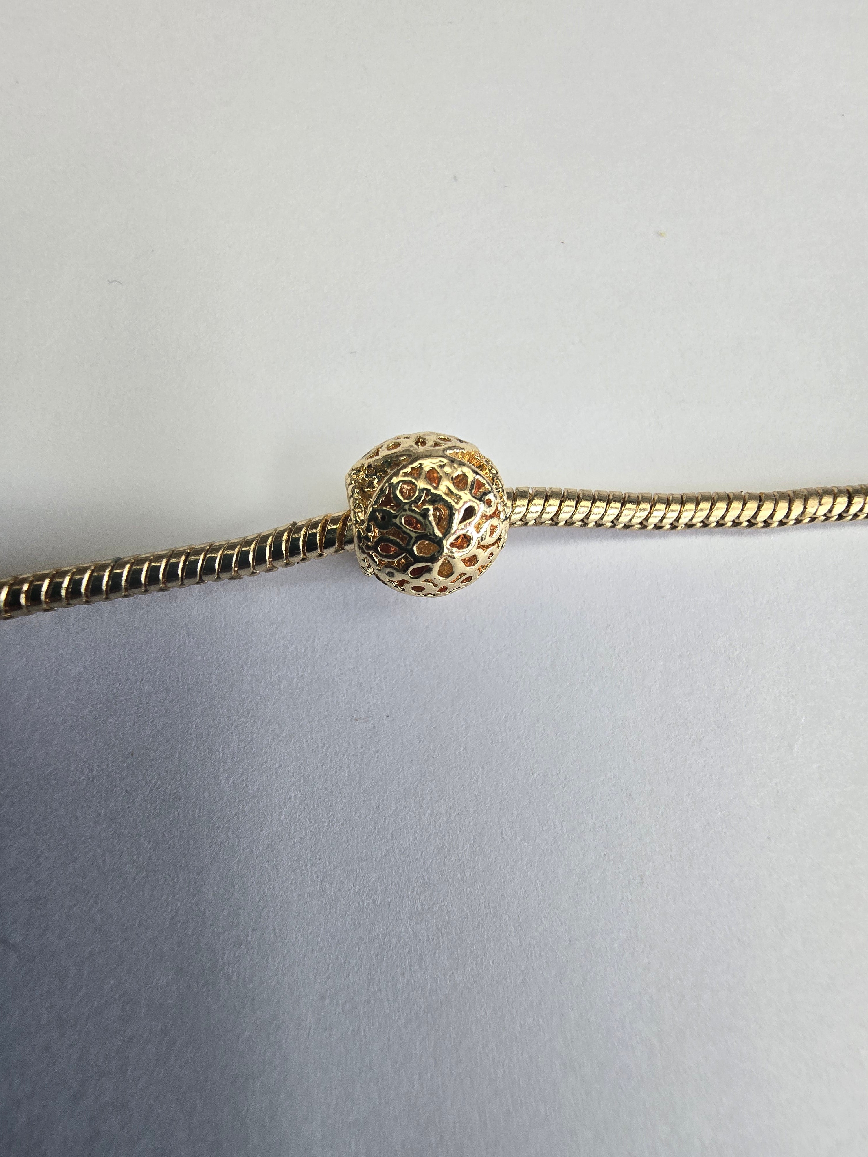Gold charm fits all charm bracelets