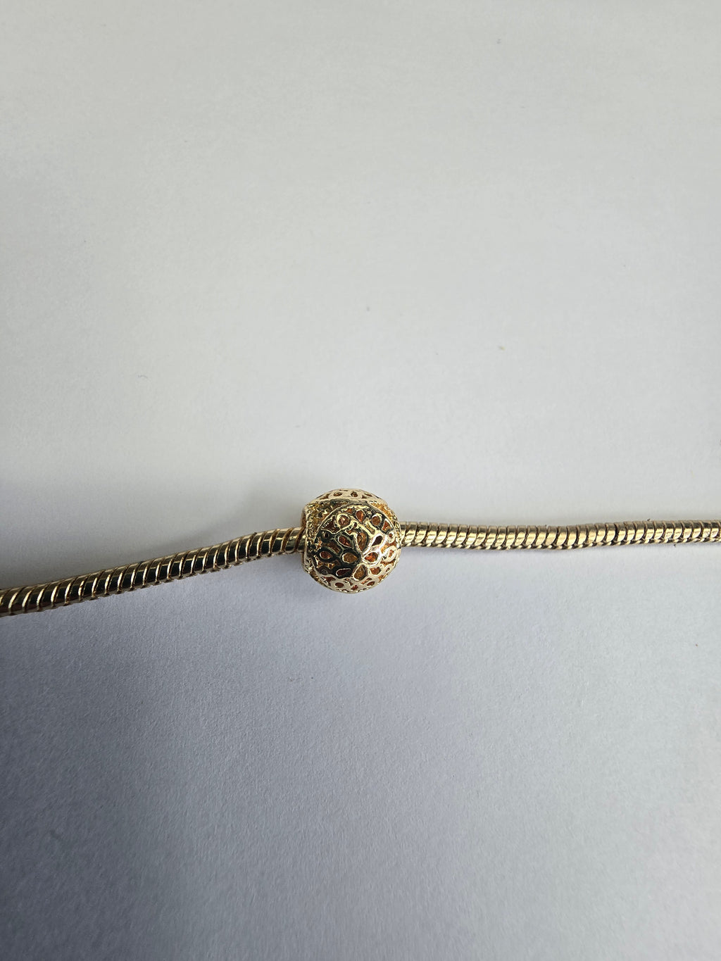 Gold charm fits all charm bracelets