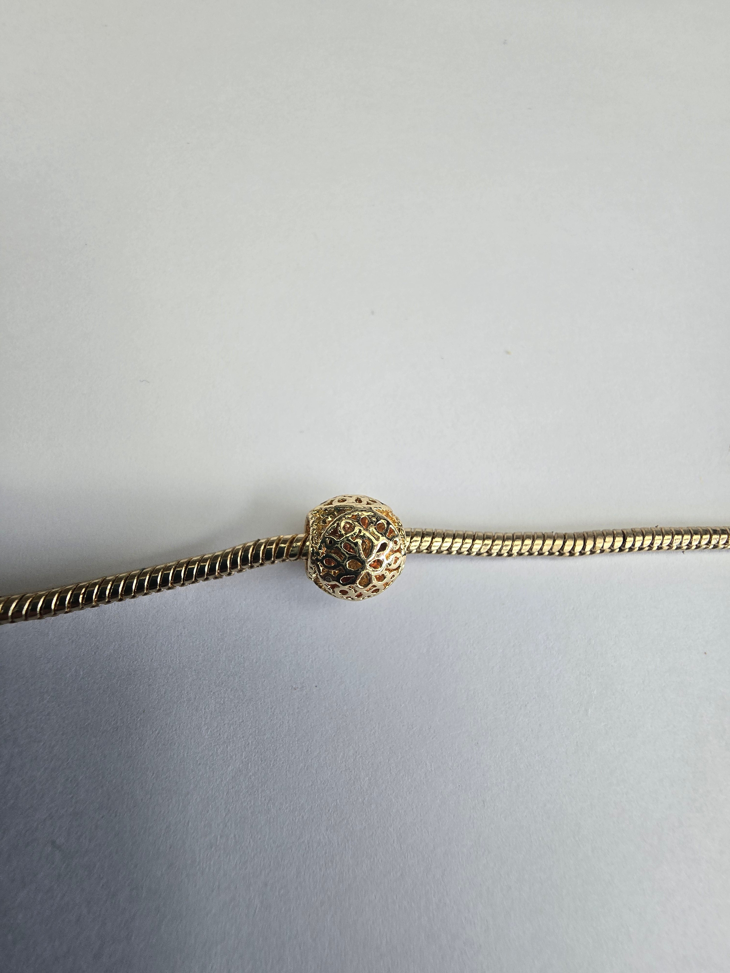 Gold charm fits all charm bracelets