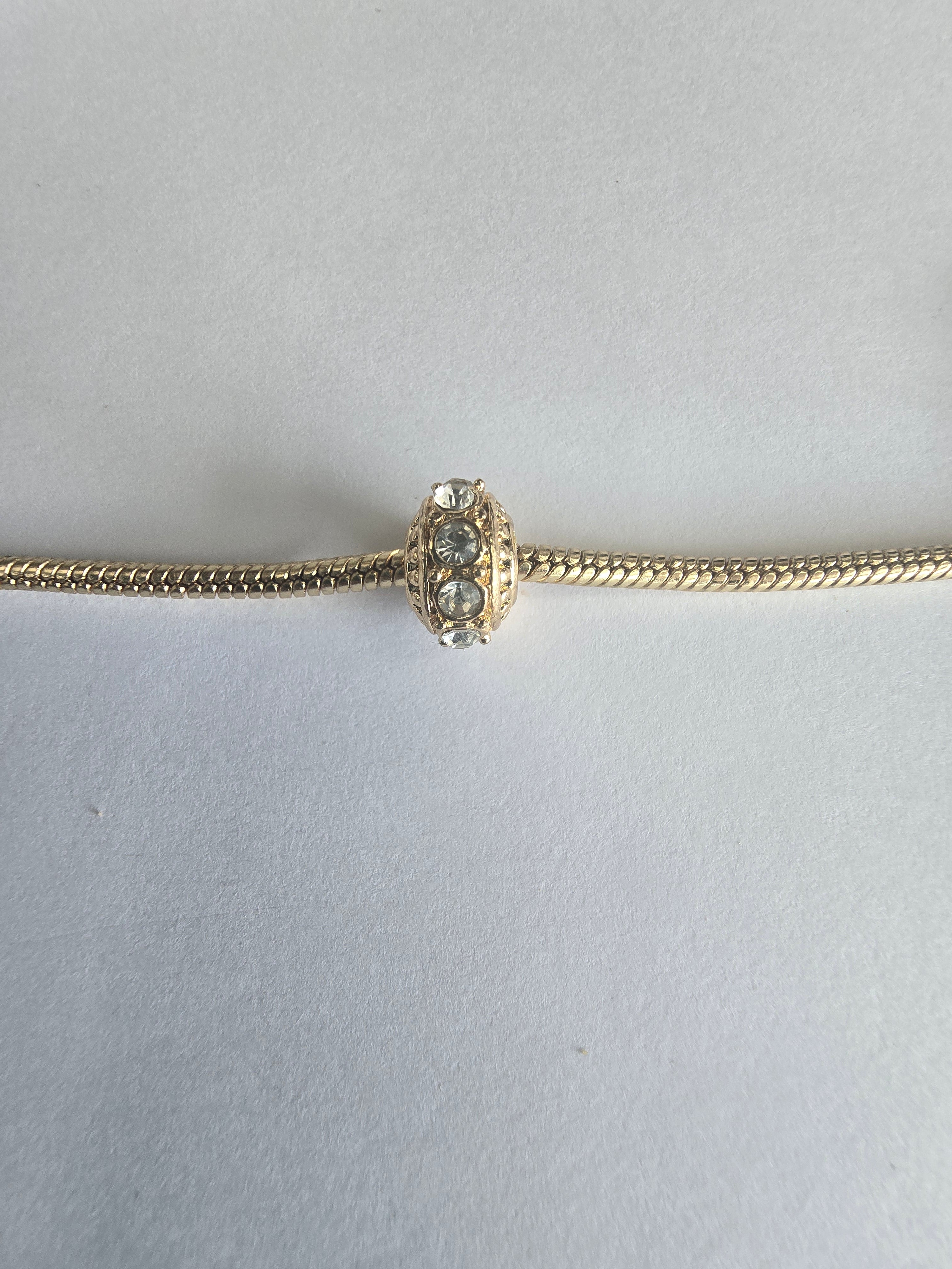Gold charm fits all charm bracelets