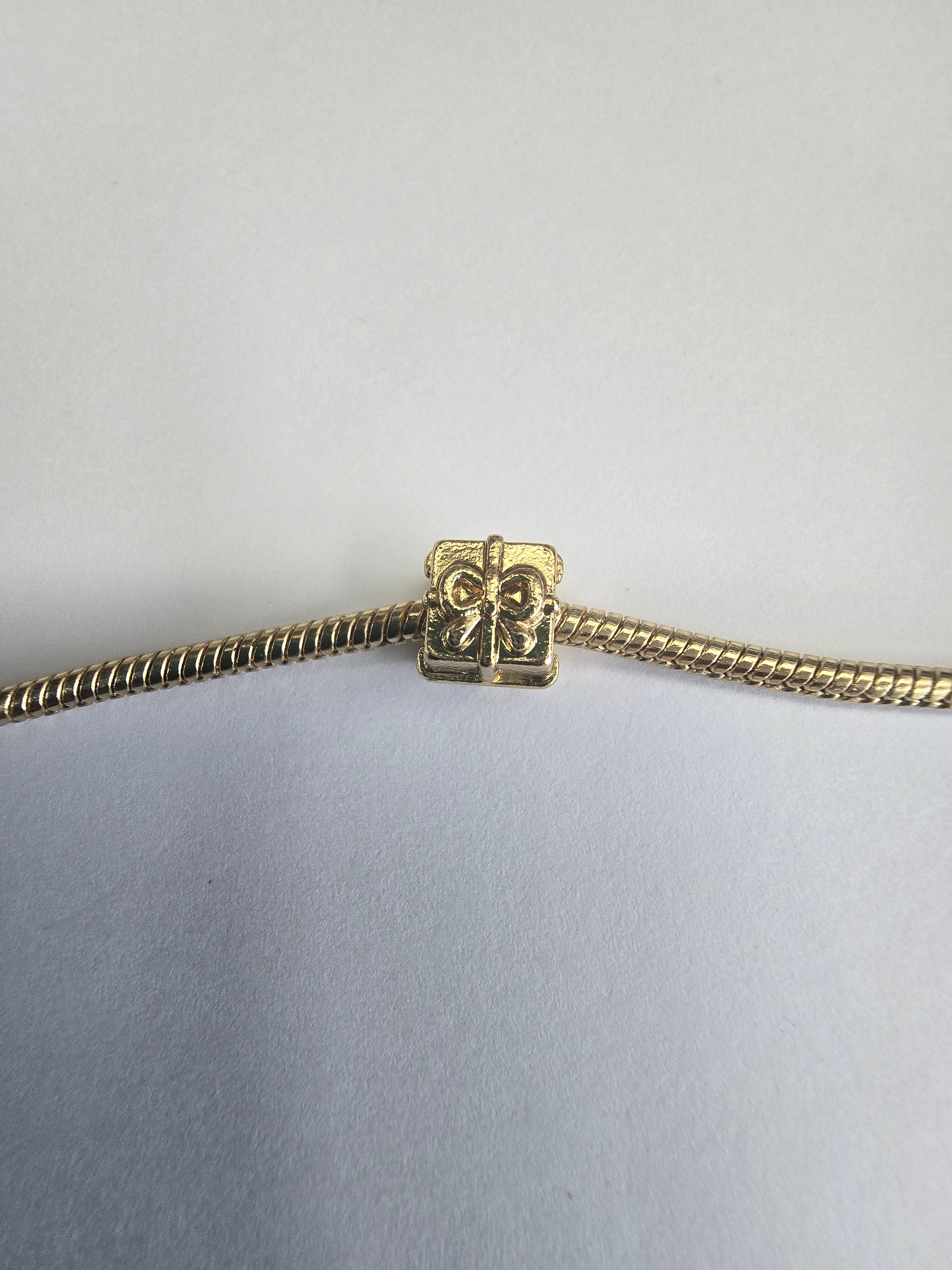 Gold charm fits all charm bracelets