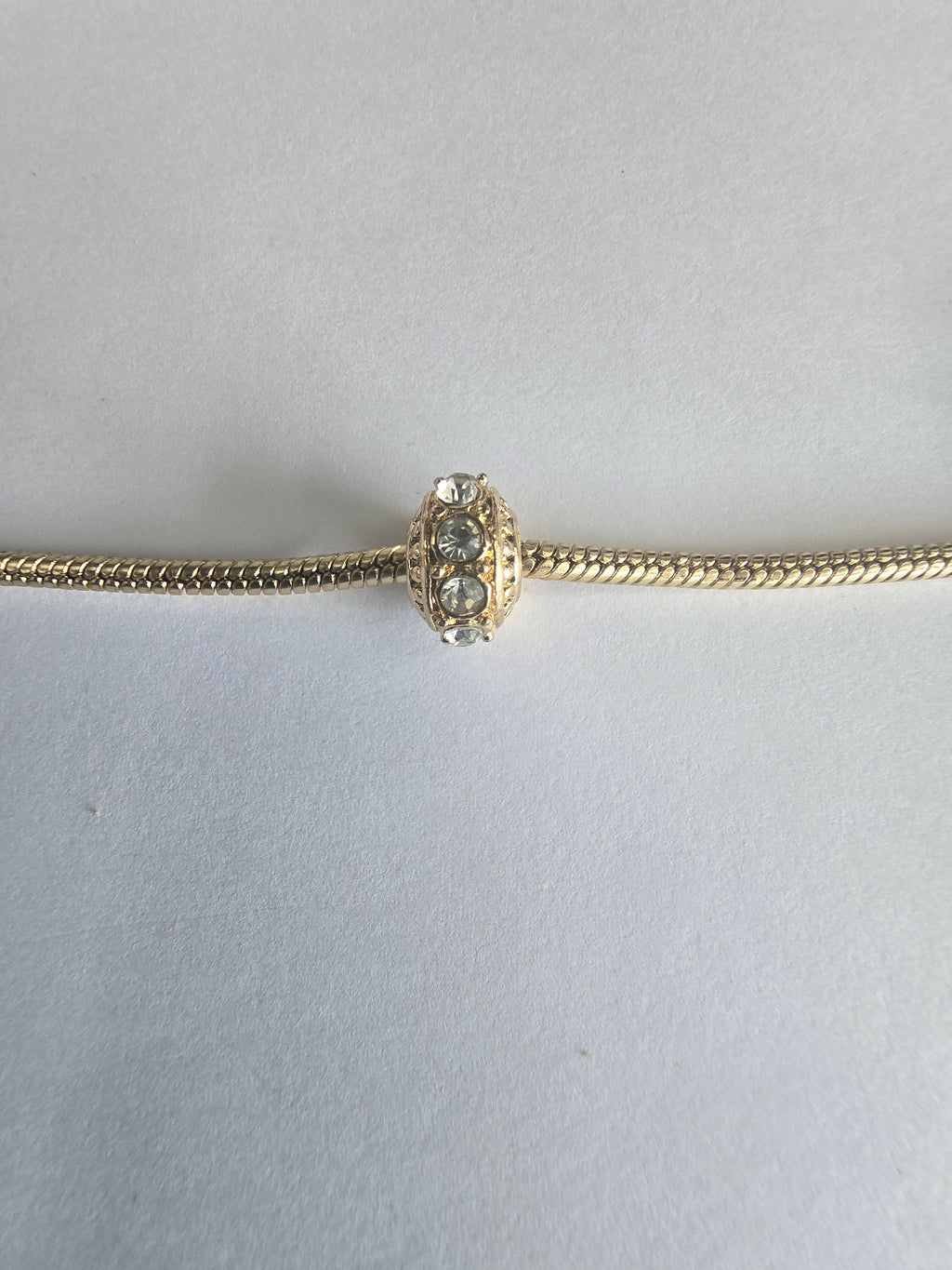 Gold charm fits all charm bracelets