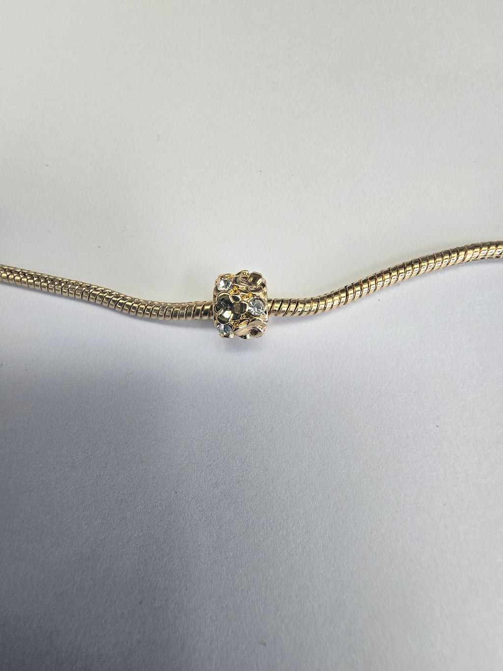 Gold charm fits all charm bracelets