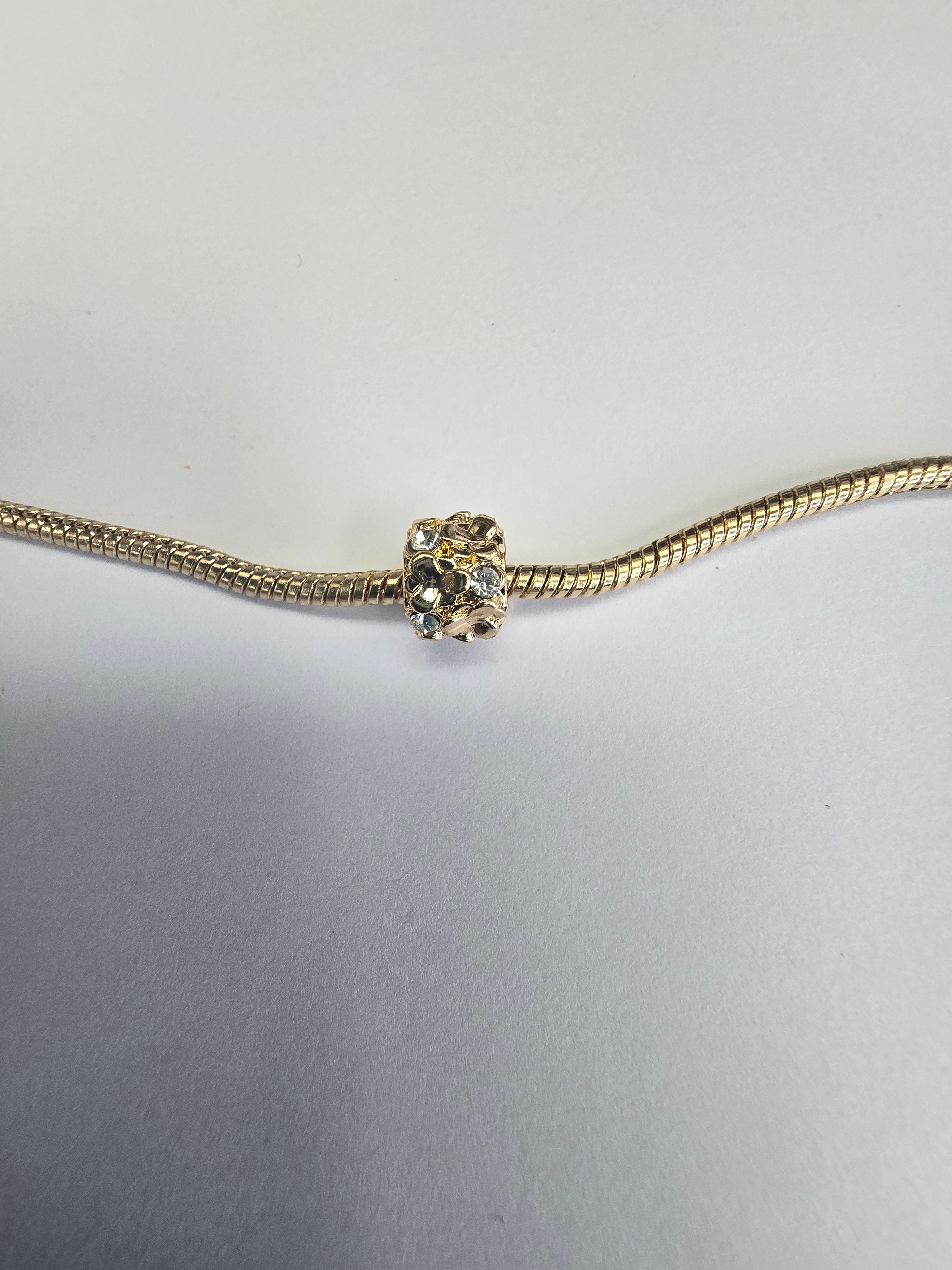 Gold charm fits all charm bracelets
