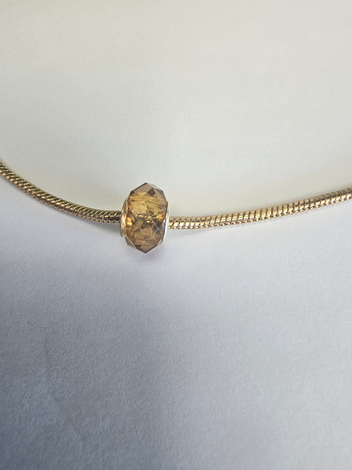 Gold charm fits all charm bracelets