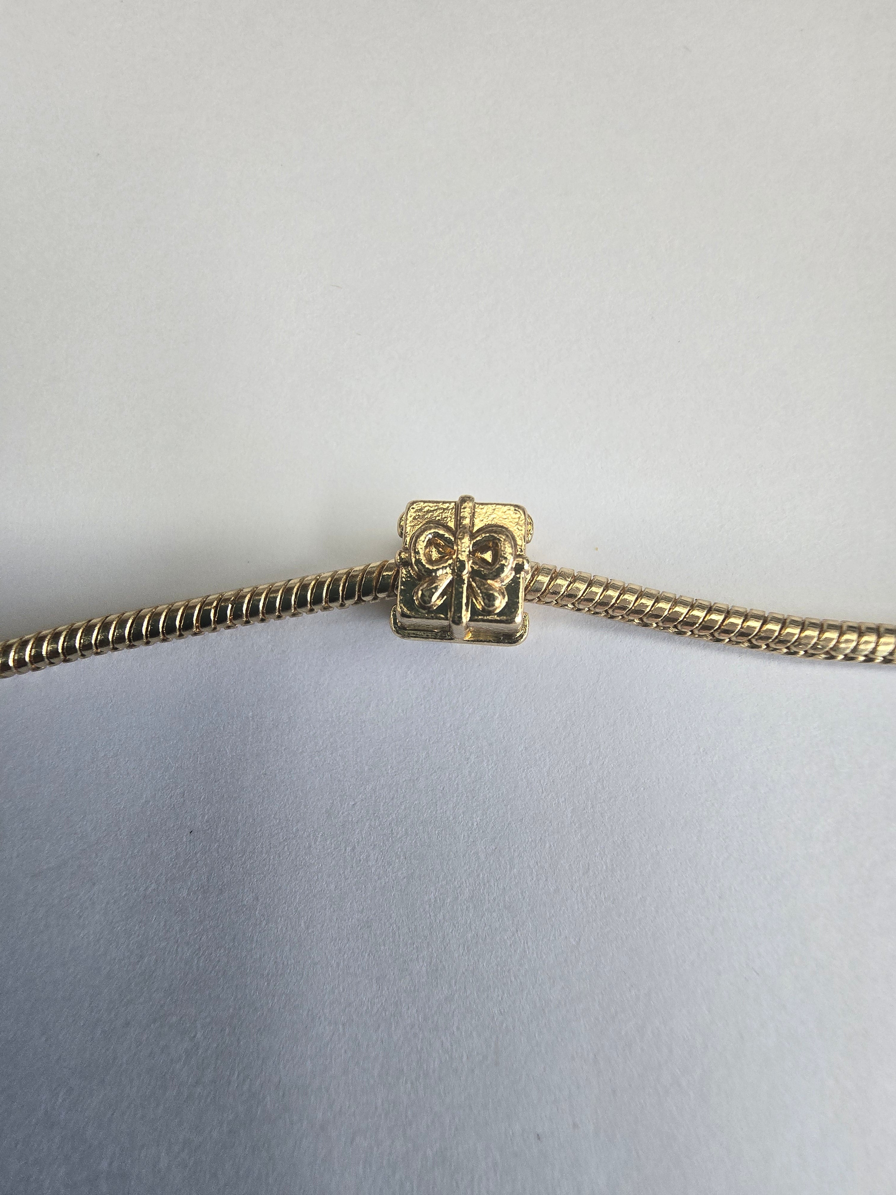 Gold charm fits all charm bracelets