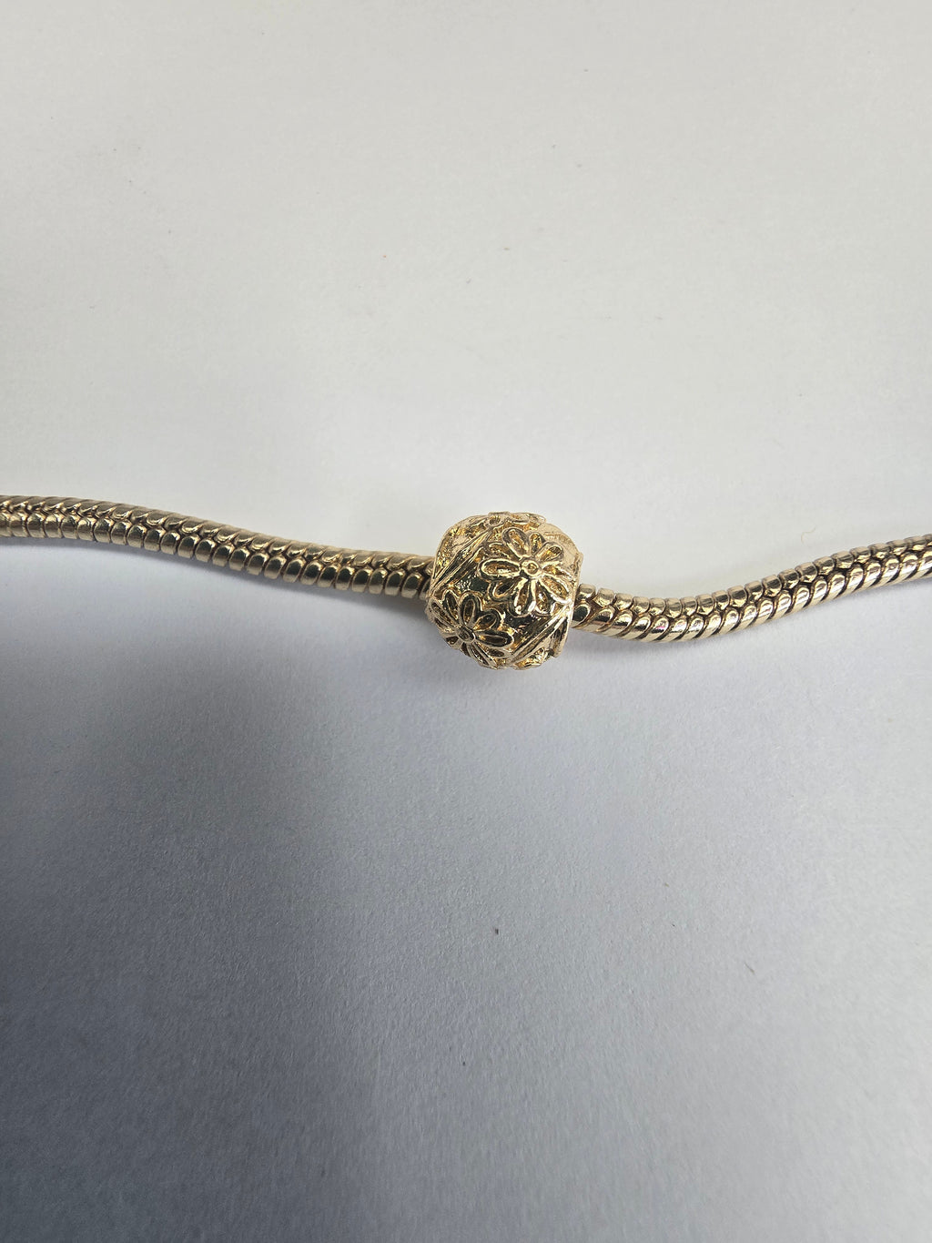 Gold charm fits all charm bracelets