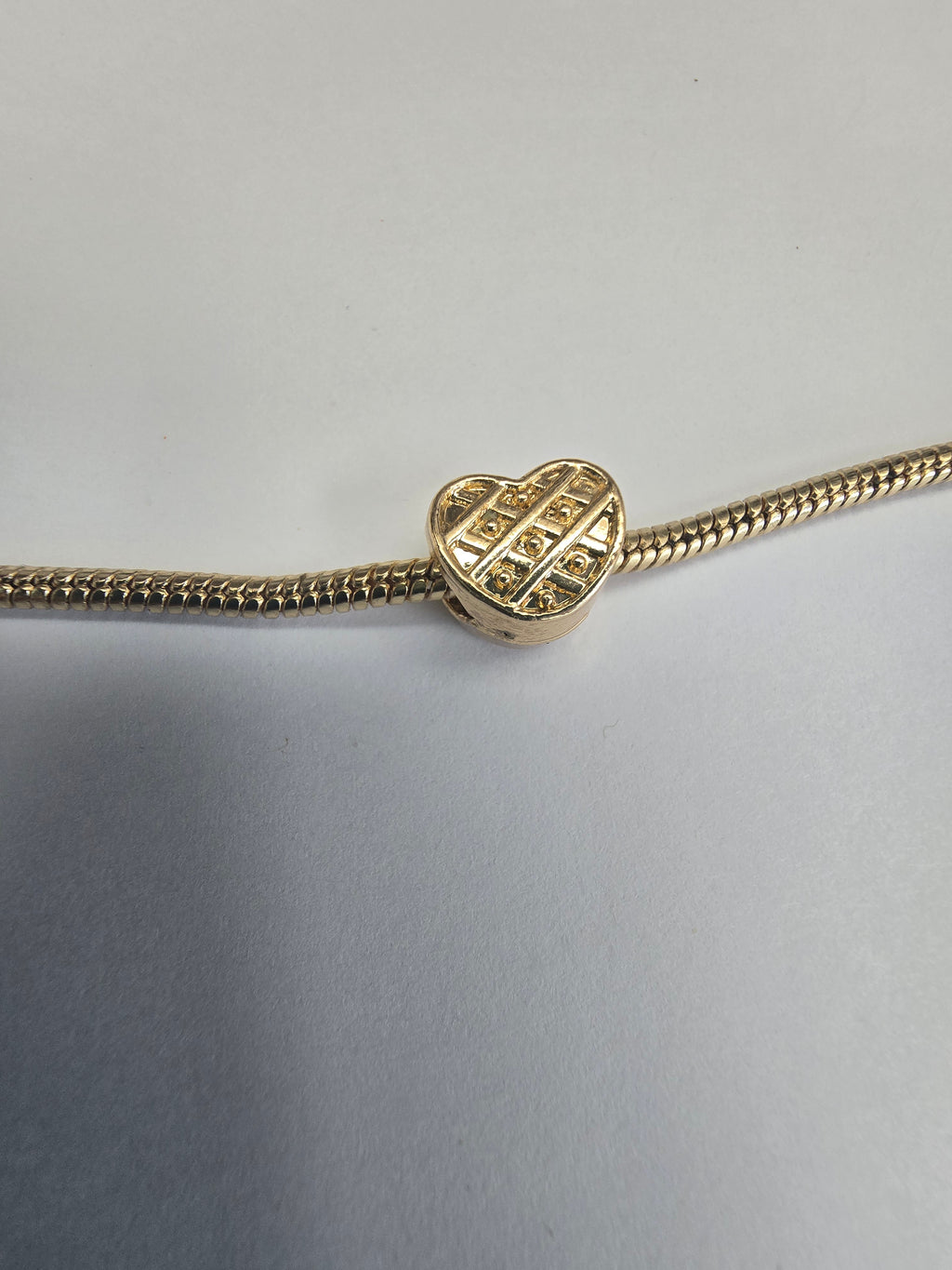 Gold charm fits all charm bracelets