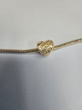 Gold charm fits all charm bracelets