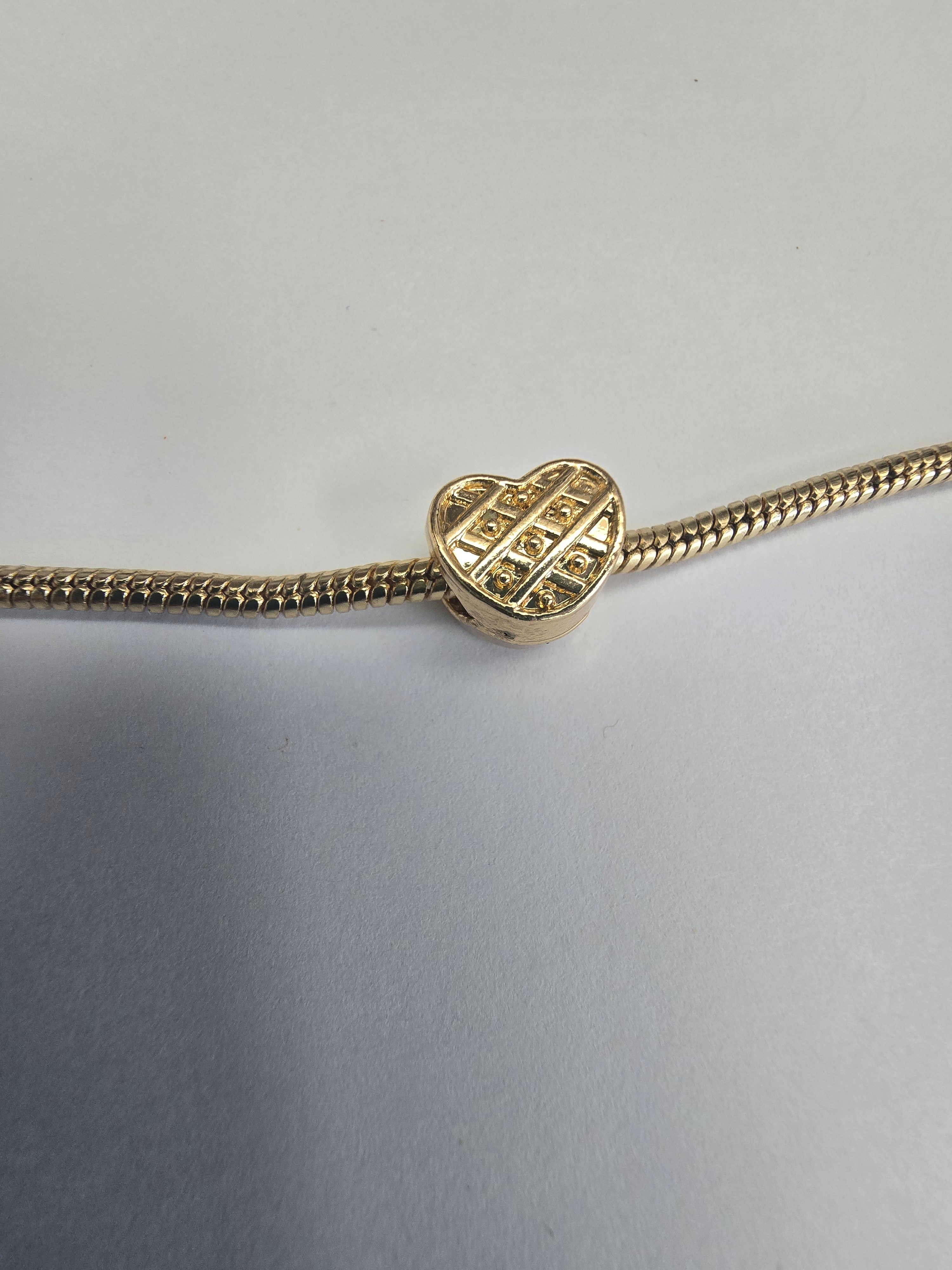 Gold charm fits all charm bracelets