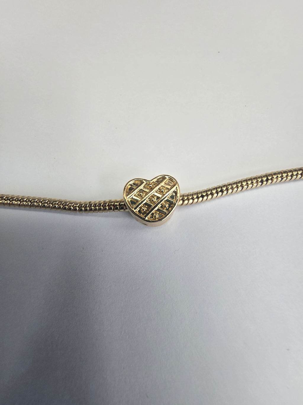 Gold charm fits all charm bracelets