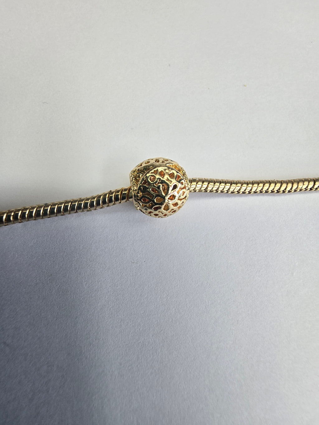 Gold charm fits all charm bracelets