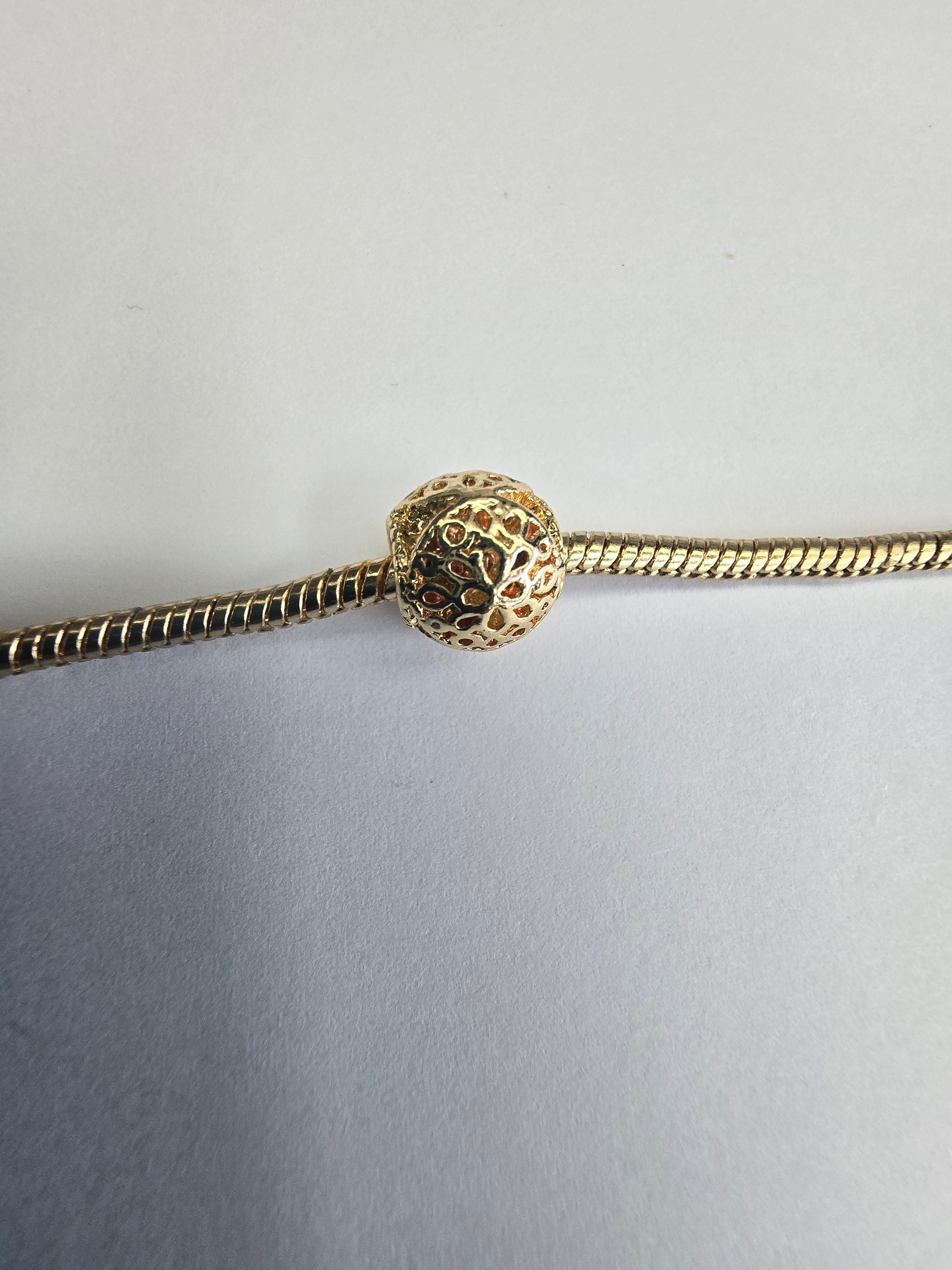 Gold charm fits all charm bracelets