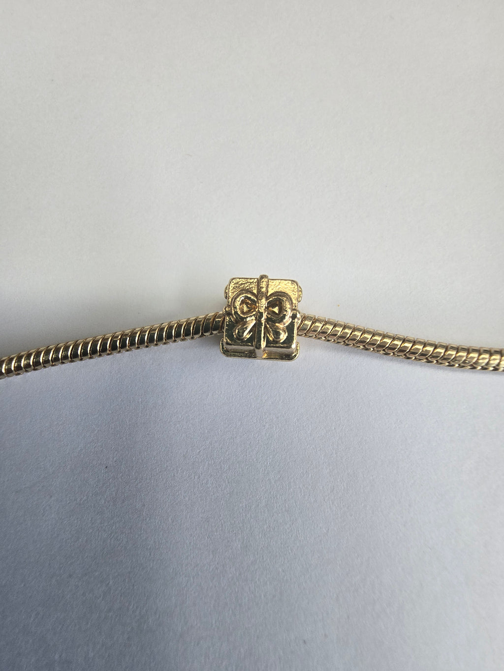Gold charm fits all charm bracelets