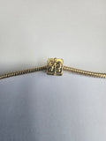 Gold charm fits all charm bracelets
