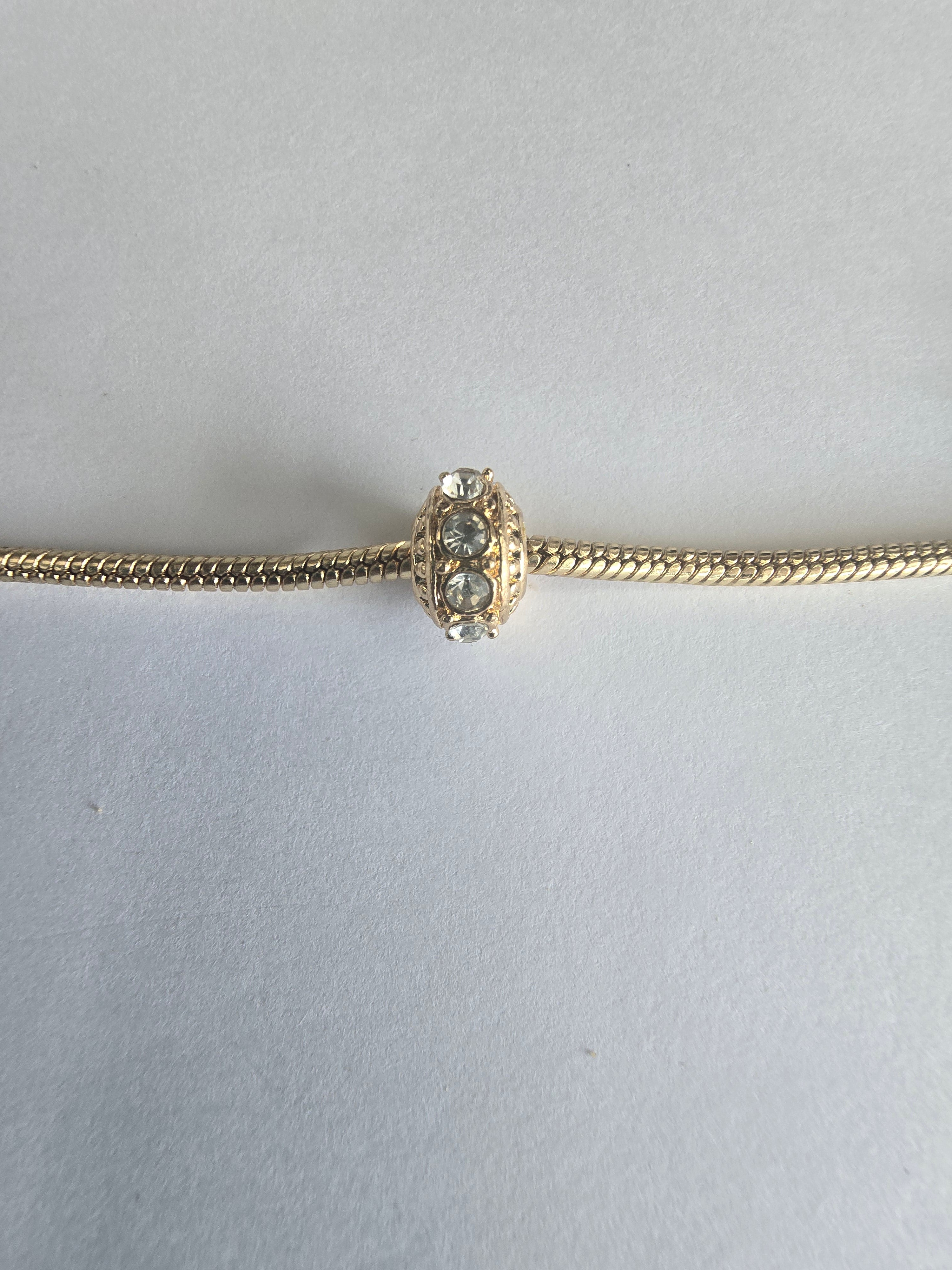 Gold charm fits all charm bracelets