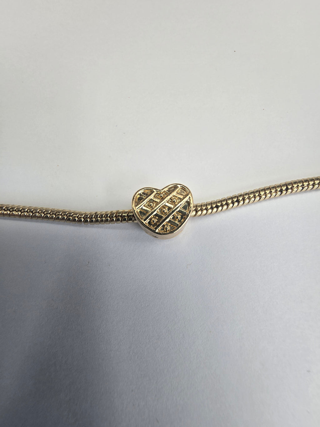 Gold charm fits all charm bracelets