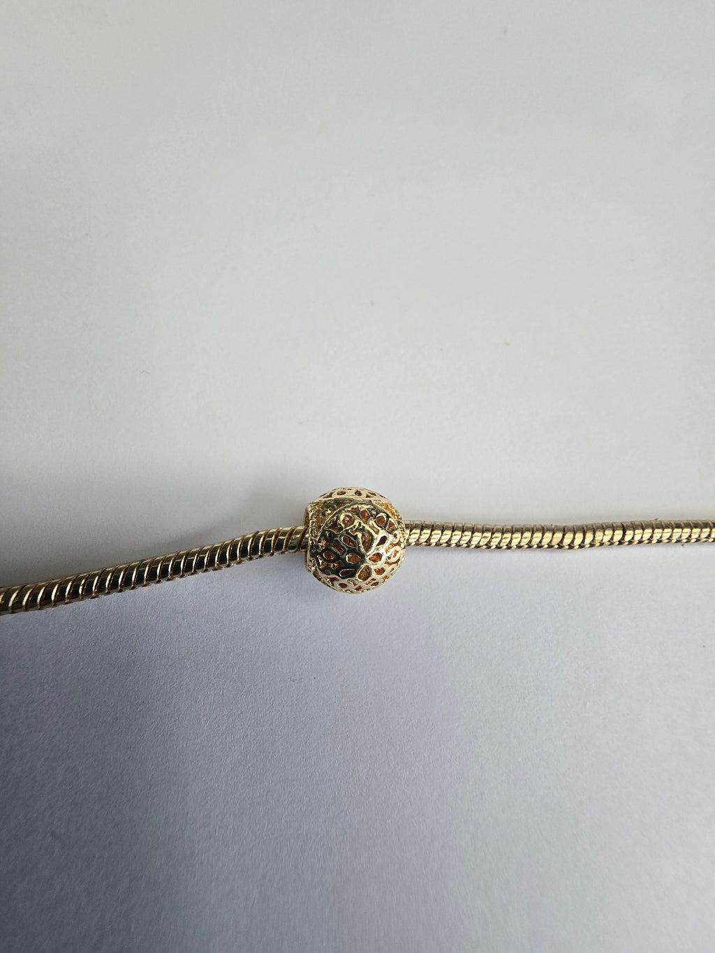 Gold charm fits all charm bracelets