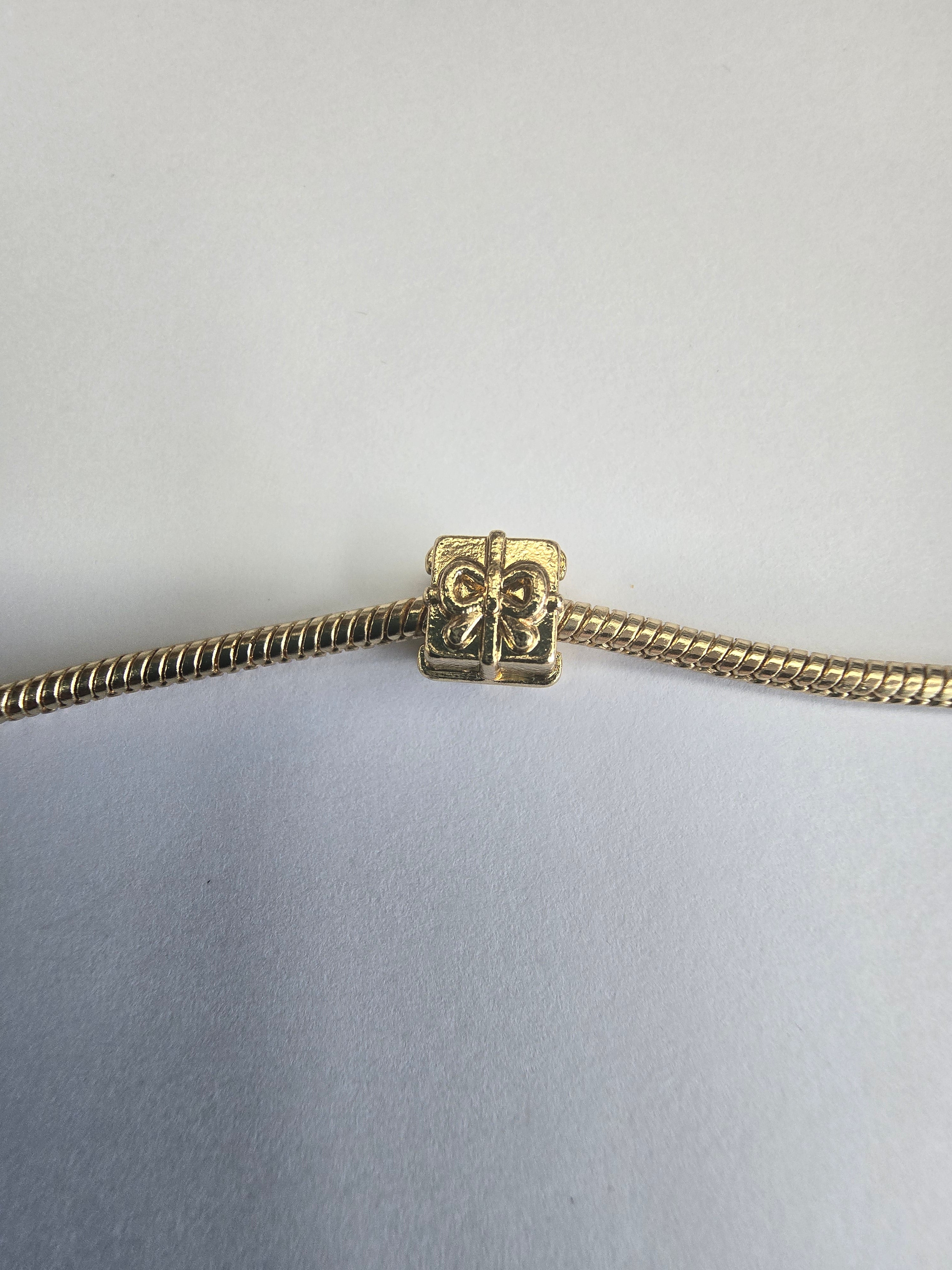 Gold charm fits all charm bracelets