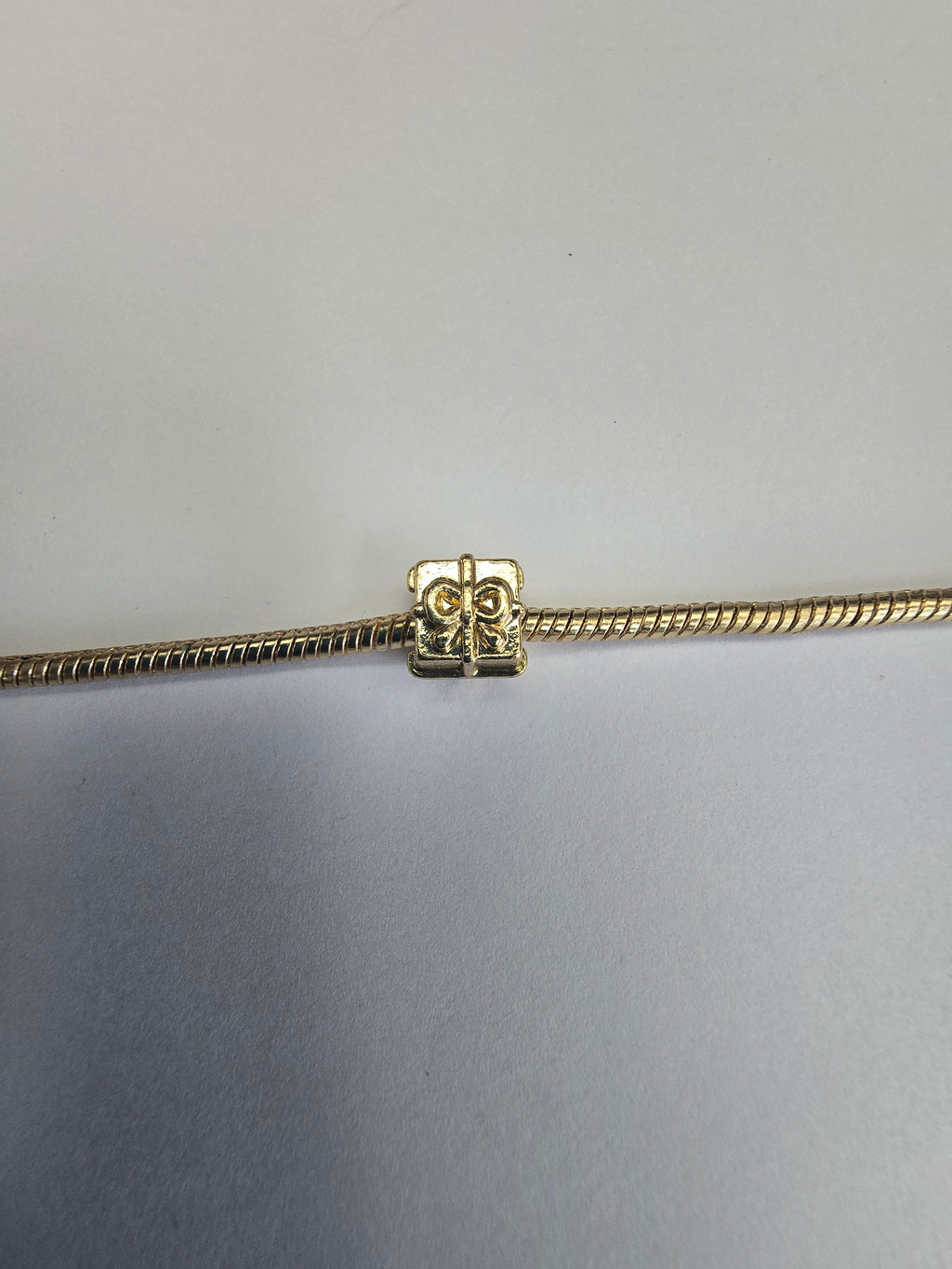 Gold charm fits all charm bracelets
