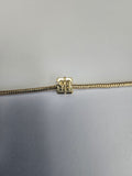 Gold charm fits all charm bracelets