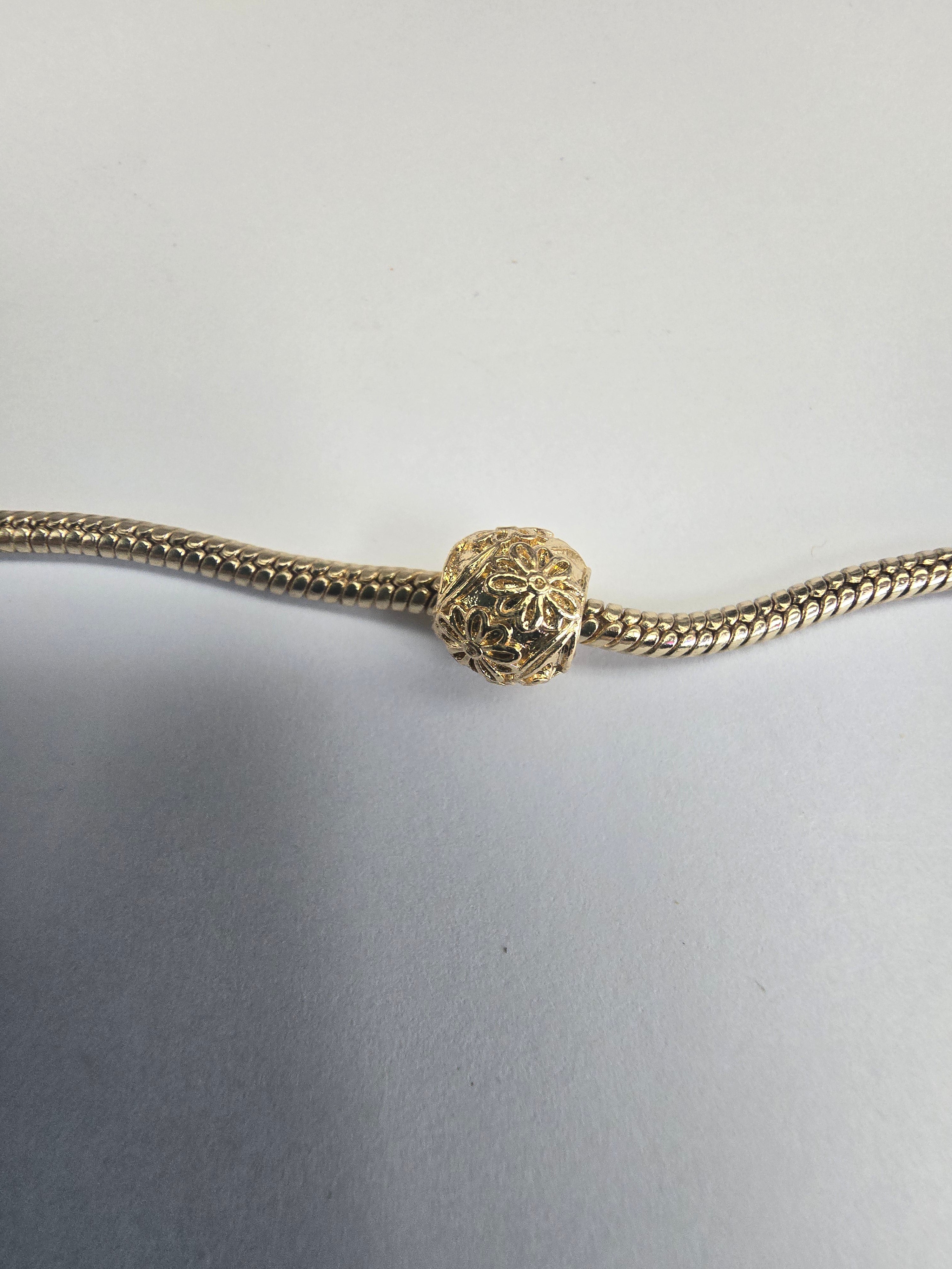 Gold charm fits all charm bracelets