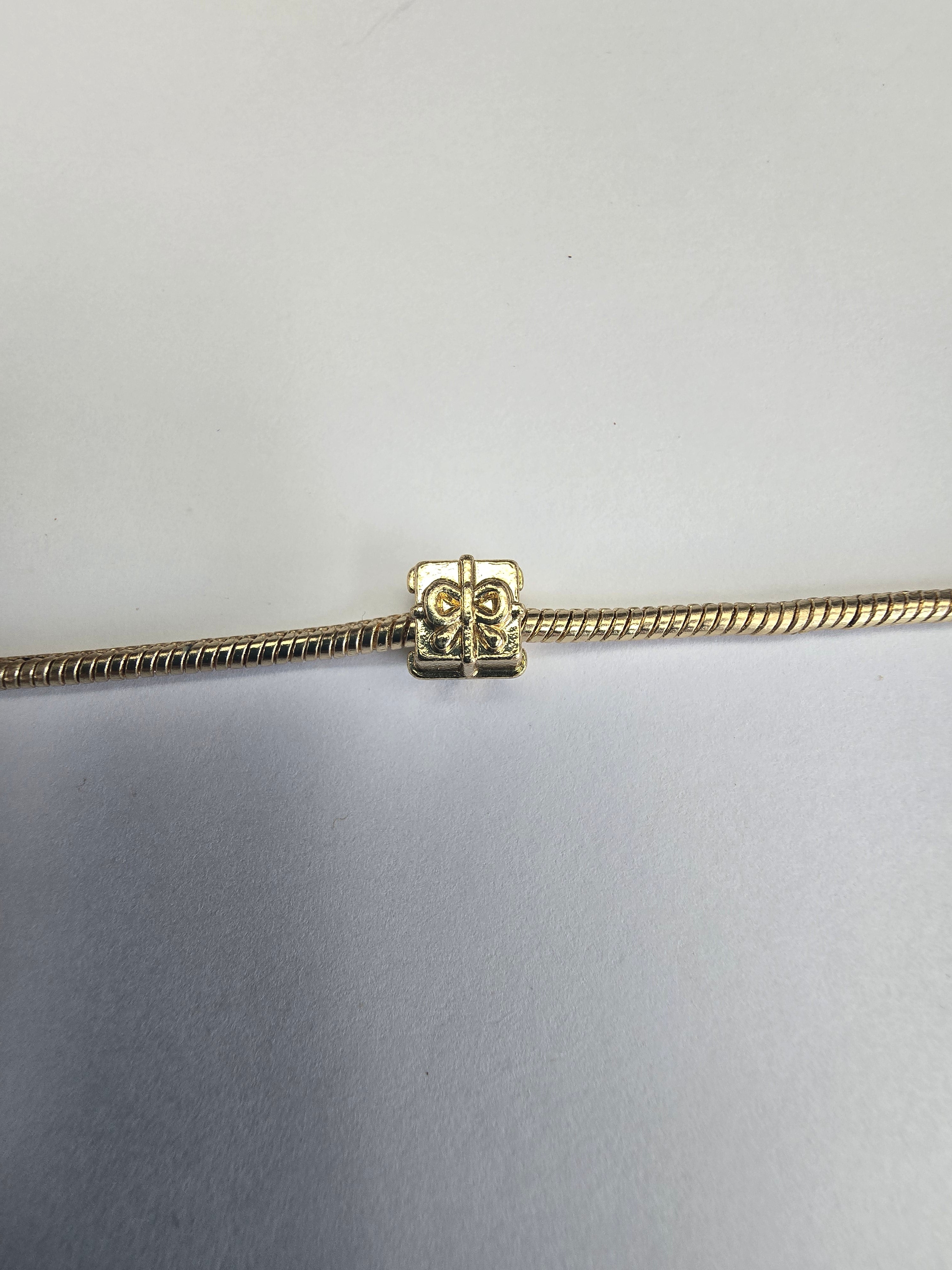 Gold charm fits all charm bracelets