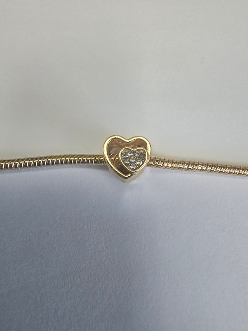 Gold charm fits all charm bracelets