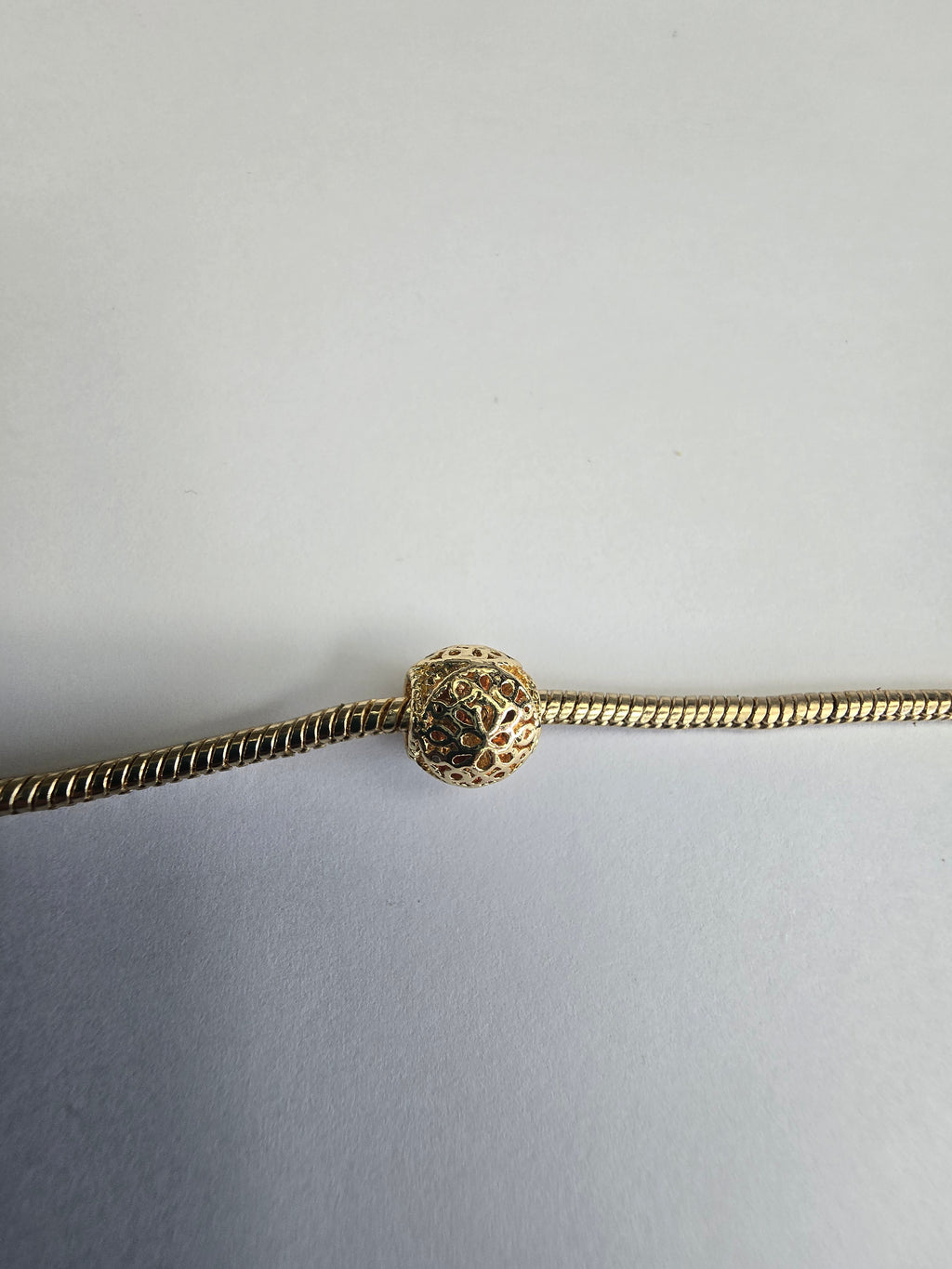 Gold charm fits all charm bracelets